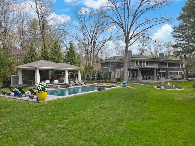 54 Lincoln Ave, Rye Brook, NY 10573 - exterior space with a lawn, a gazebo, a patio, and an outdoor fire pit