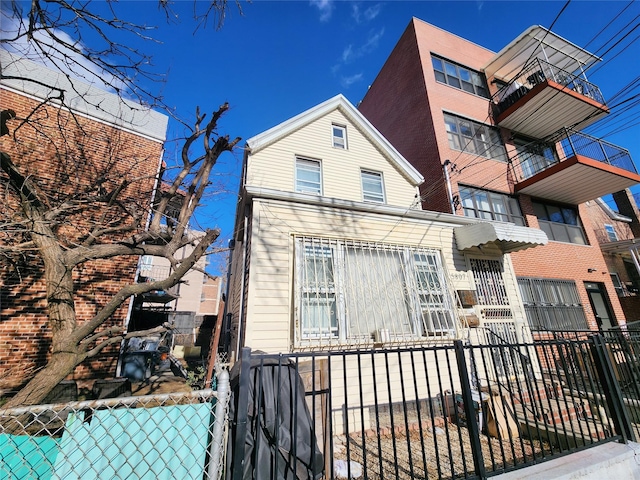 multi unit property with a fenced front yard