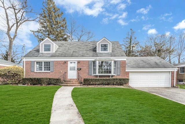 cape cod-style house with driveway, brick siding, a front lawn, and an attached garage