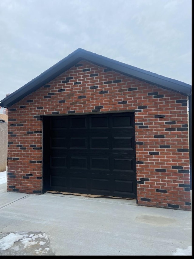 garage featuring driveway