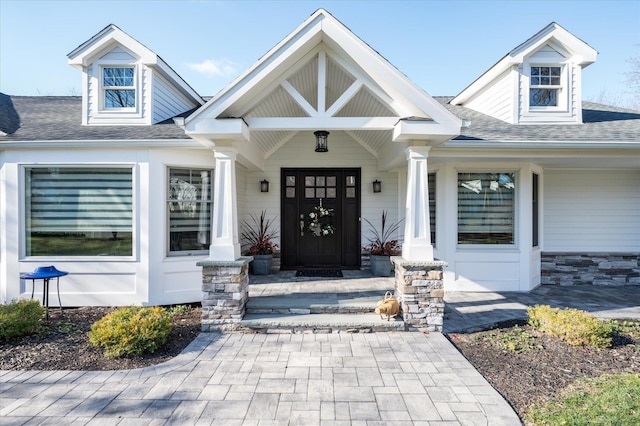 doorway to property with covered porch