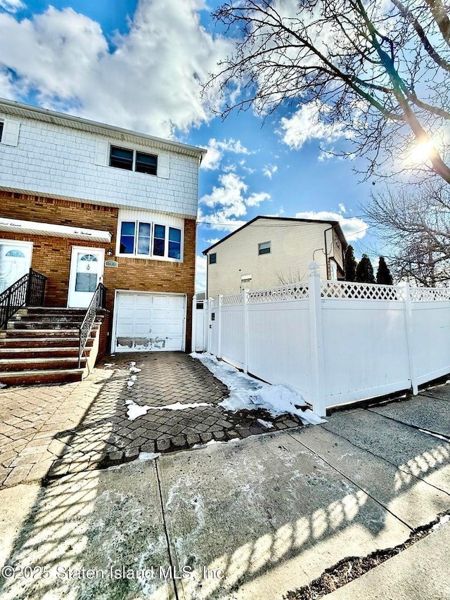 view of front of home featuring a garage