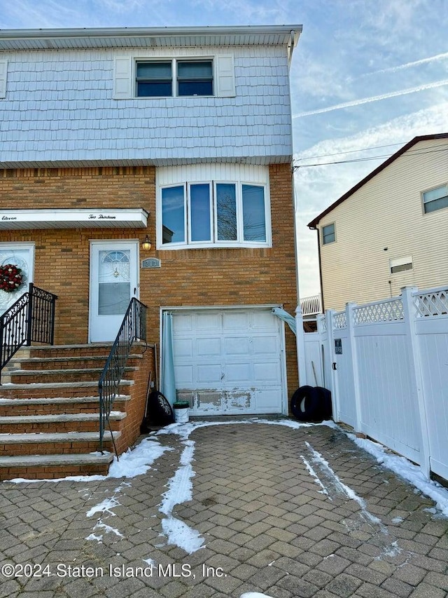 view of front of property featuring a garage