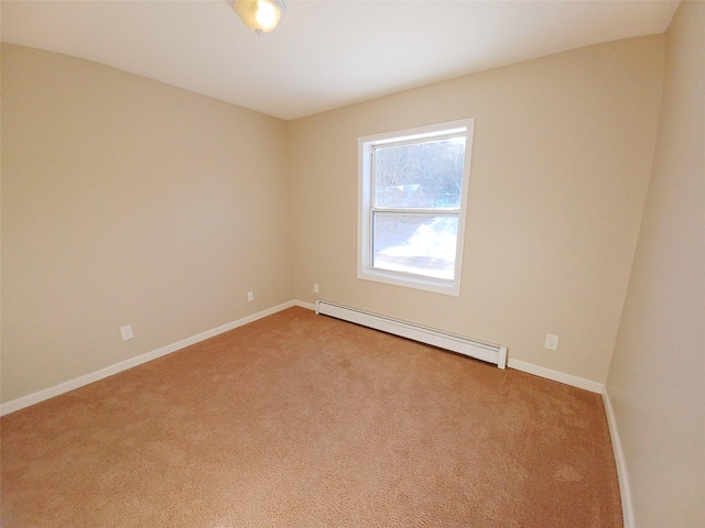 empty room with baseboard heating and light colored carpet