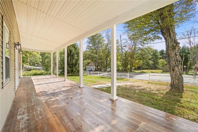 deck featuring a lawn