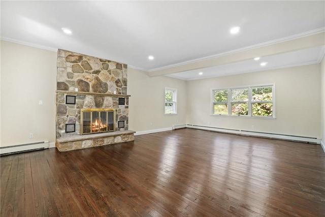 unfurnished living room featuring hardwood / wood-style floors, a stone fireplace, ornamental molding, and baseboard heating