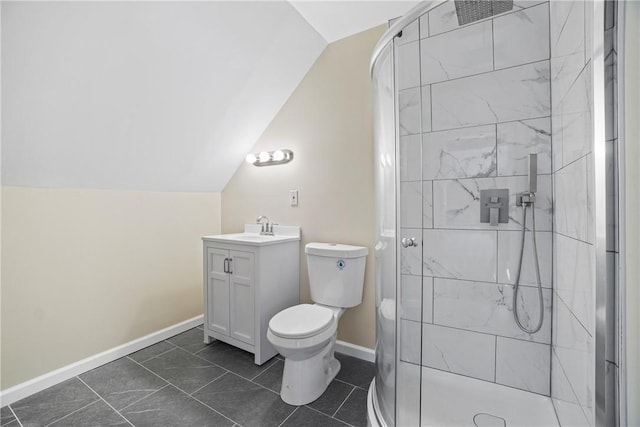 bathroom with lofted ceiling, vanity, toilet, and an enclosed shower