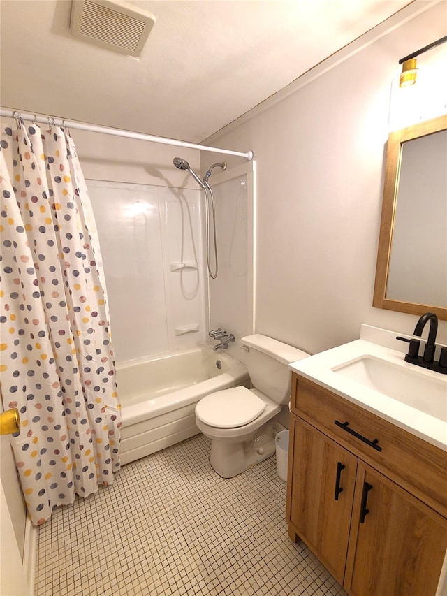 full bathroom with vanity, shower / tub combo with curtain, tile patterned floors, and toilet