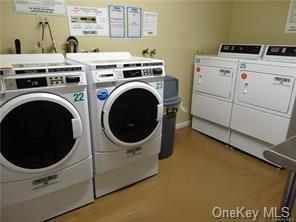 washroom with washer and clothes dryer