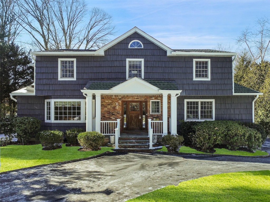 view of front of home with a front yard