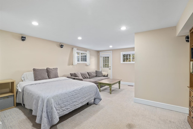 bedroom with light carpet