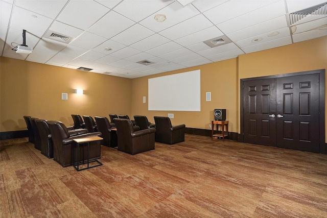 cinema room with a drop ceiling