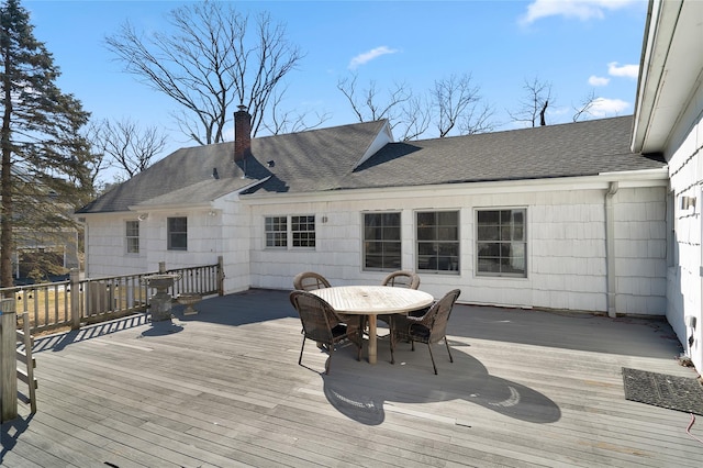 deck with outdoor dining space