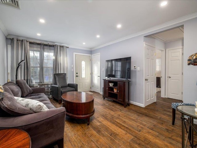 living room featuring ornamental molding and dark hardwood / wood-style floors