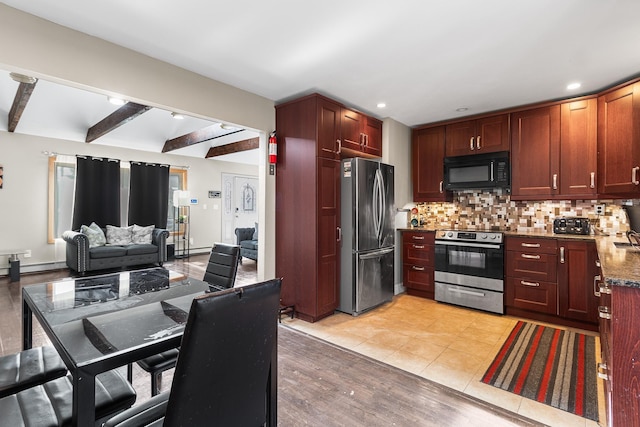 kitchen featuring light tile patterned floors, stainless steel appliances, light stone counters, decorative backsplash, and beamed ceiling