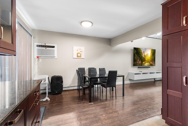 dining space with a baseboard radiator, dark hardwood / wood-style floors, and a wall mounted AC