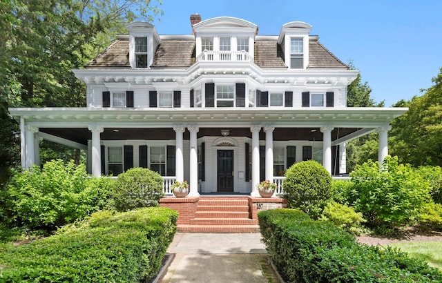 157 Merlin Ave, Sleepy Hollow, NY 10591 - view of front of home featuring a high end roof, a porch, and mansard roof