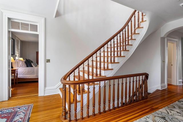 157 Merlin Ave, Sleepy Hollow, NY 10591 - stairway featuring wood finished floors and arched walkways