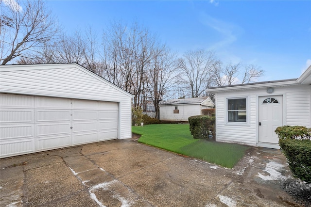 garage with a yard