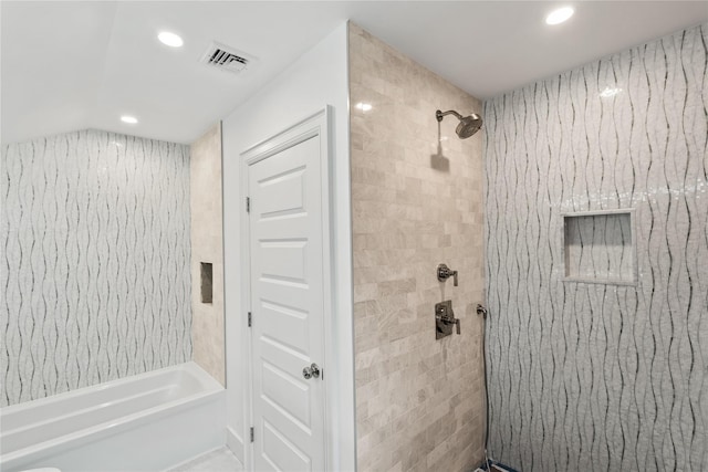 bathroom with vaulted ceiling