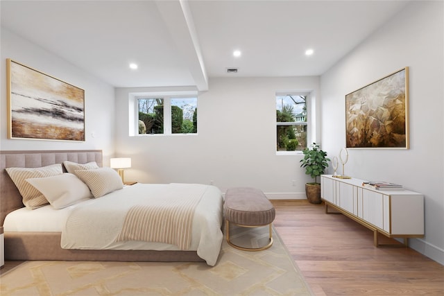 bedroom with light wood-type flooring