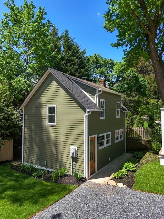 68 Glenlawn Ave, Sea Cliff, NY 11579 - view of side of home with a chimney and a patio area