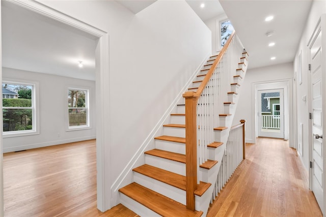 68 Glenlawn Ave, Sea Cliff, NY 11579 - staircase with wood finished floors and recessed lighting