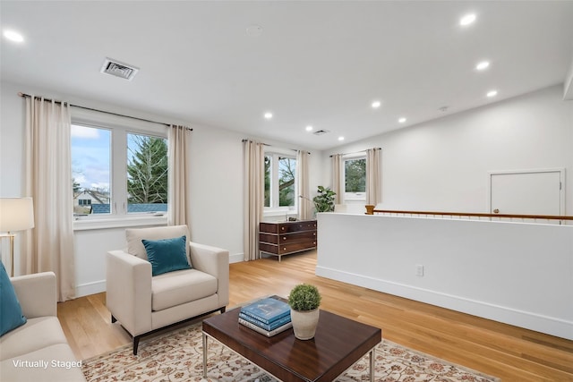 68 Glenlawn Ave, Sea Cliff, NY 11579 - living area with light wood-type flooring and recessed lighting