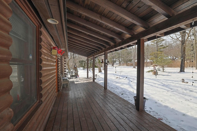 view of snow covered deck