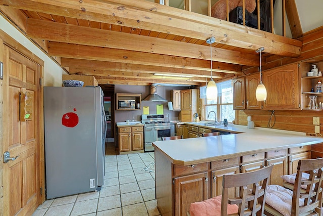 kitchen with a peninsula, wall chimney range hood, stainless steel appliances, and light countertops
