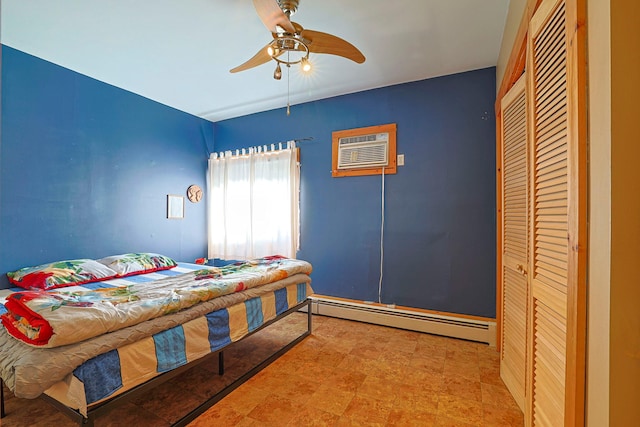 bedroom with a wall mounted AC, a baseboard radiator, a closet, and a ceiling fan