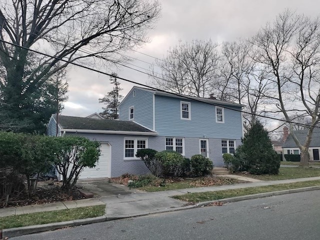 view of front of property featuring a garage