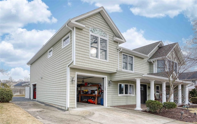 view of front of house with a garage and covered porch