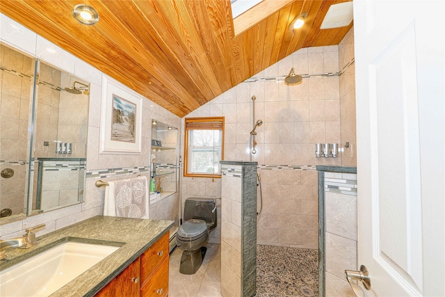 bathroom featuring toilet, wood ceiling, vaulted ceiling, tile walls, and a tile shower