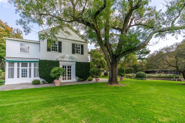 TEN Lands End Rd, Locust Valley, NY 11560 - greek revival inspired property with french doors and a front yard