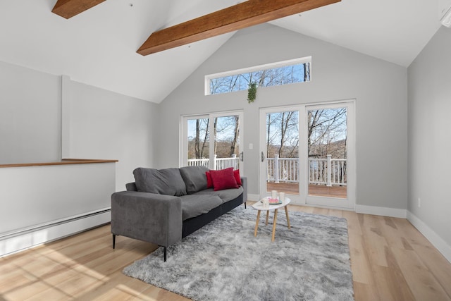 living room with baseboards, wood finished floors, baseboard heating, beam ceiling, and high vaulted ceiling