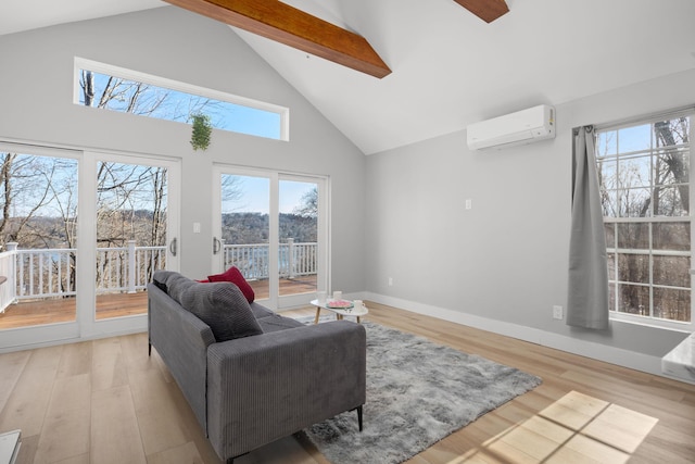 living room featuring high vaulted ceiling, a wealth of natural light, light wood-style floors, and an AC wall unit