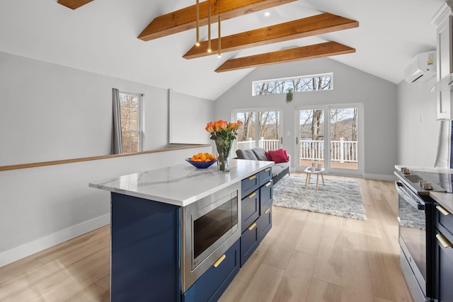 kitchen with light wood-style flooring, beamed ceiling, appliances with stainless steel finishes, open floor plan, and blue cabinetry