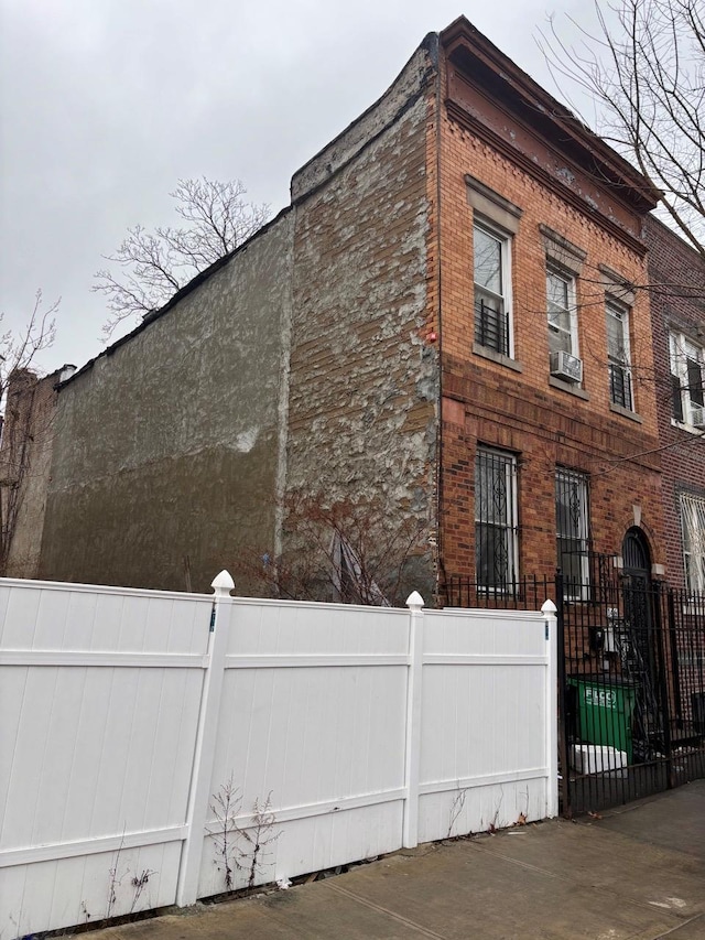 view of property exterior with cooling unit