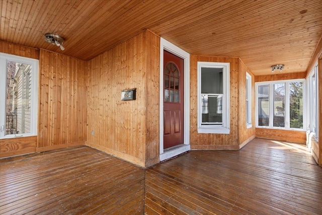 interior space featuring wooden ceiling