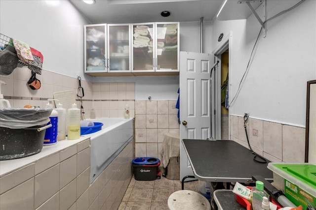 bathroom featuring tile walls and tile patterned floors