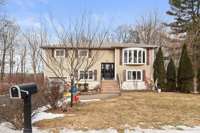 split foyer home with a yard