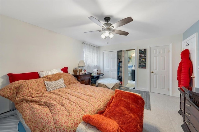 carpeted bedroom with a closet and ceiling fan