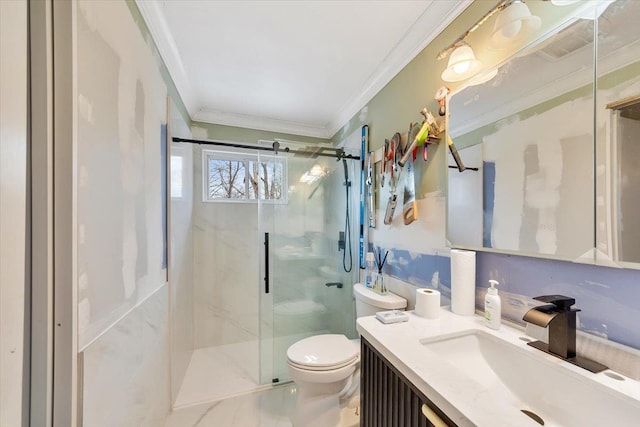 bathroom with crown molding, toilet, vanity, and walk in shower