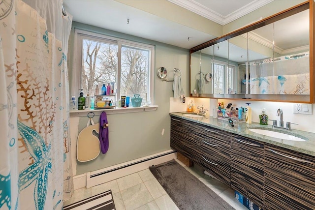 bathroom featuring vanity, crown molding, tile patterned floors, and baseboard heating