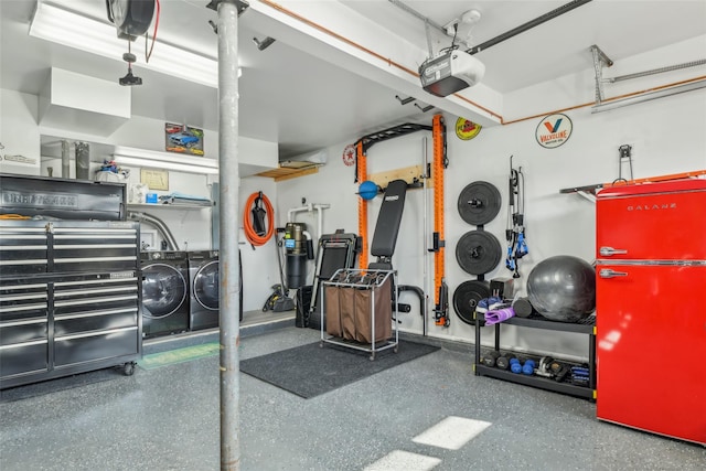 garage featuring independent washer and dryer, a garage door opener, and refrigerator