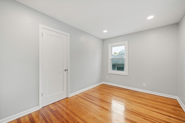 empty room featuring hardwood / wood-style floors