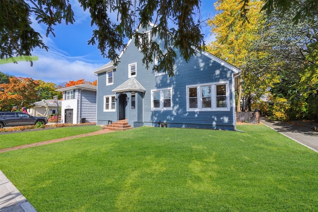 view of front facade with a front yard