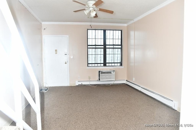 empty room with a wall mounted air conditioner, carpet floors, ceiling fan, baseboard heating, and crown molding