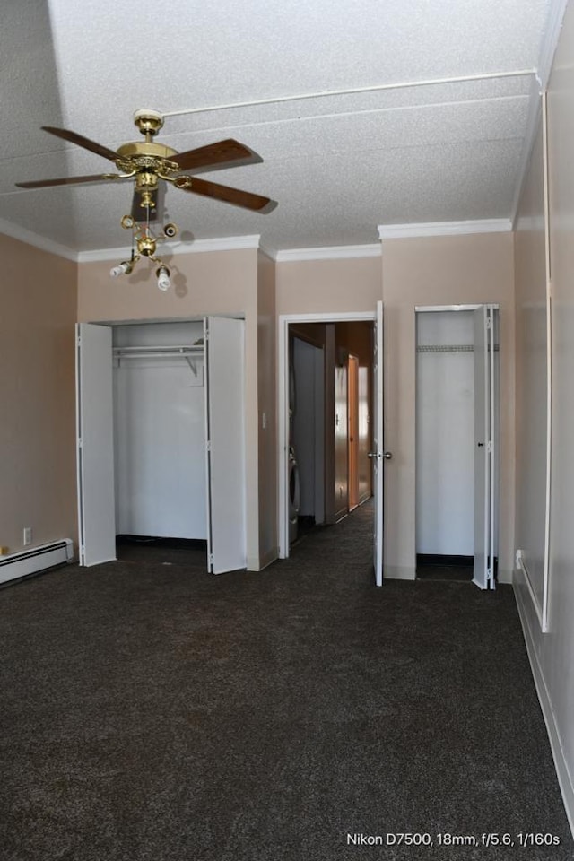 unfurnished bedroom featuring ornamental molding, washer / dryer, and a textured ceiling